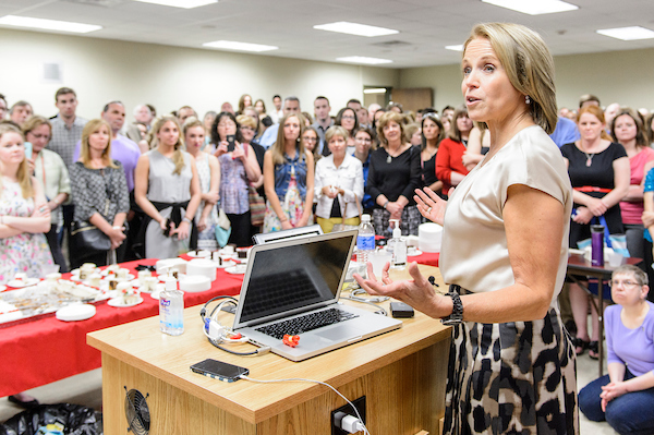 Television journalist Katie Couric speaks to a group of UW journalism graduates and their parents at a reception in Vilas Hall.