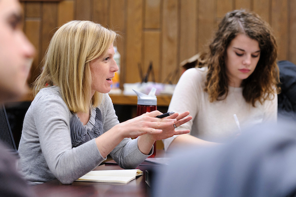 Stacy Forster, an instructor in the School of Journalism and Mass Communication, co-teaches an intermediate-reporting journalism class for undergraduates in Vilas Hall.