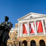 W banners hang from the columns of Bascom Hall at the University of Wisconsin-Madison during winter.