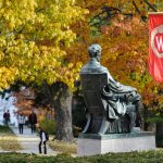 The Abraham Lincoln statue remains sentinel to the changing seasons on Bascom Hill at the University of Wisconsin-Madison as the tree foliage continues to change colors during autumn.