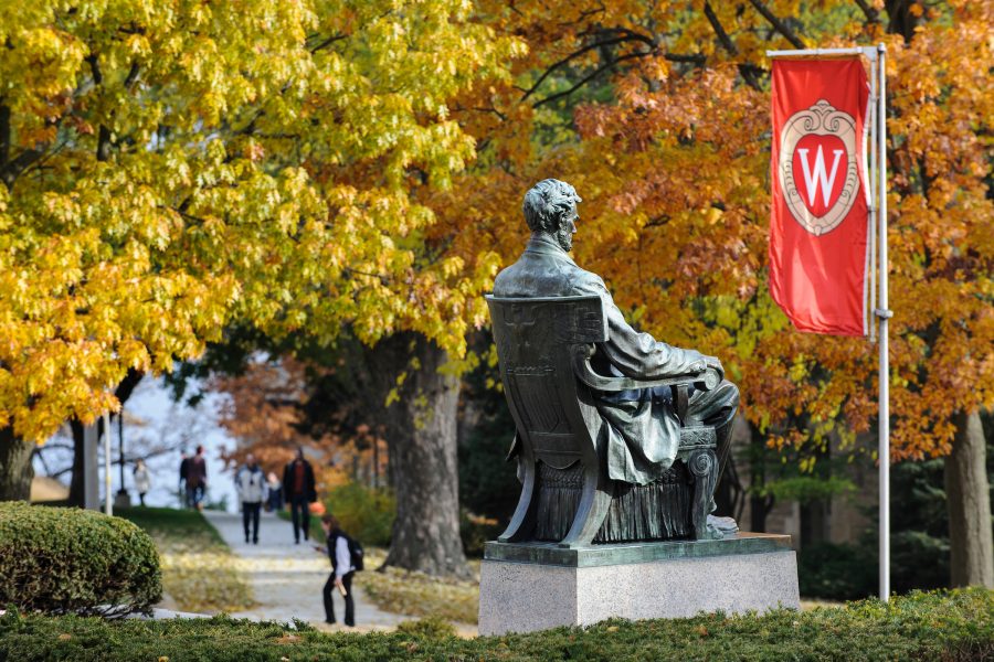 The Abraham Lincoln statue remains sentinel to the changing seasons on Bascom Hill at the University of Wisconsin-Madison as the tree foliage continues to change colors during autumn.