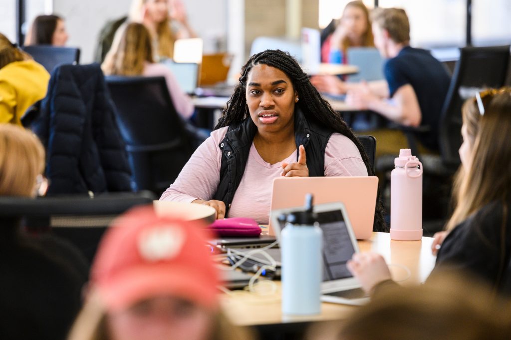 Enjoyiana Nururdin, participates in a group activity during a Journalism 563: Law of Mass Communication class taught by Associate Professor Kathleen Culver in Helen C. White Hall at the University of Wisconsin-Madison on March 4, 2020. Culver, assistant professor of journalism and mass communication, is one of thirteen recipients of the 2020 Distinguished Teaching Award (DTA). (Photo by Jeff Miller / UW-Madison)