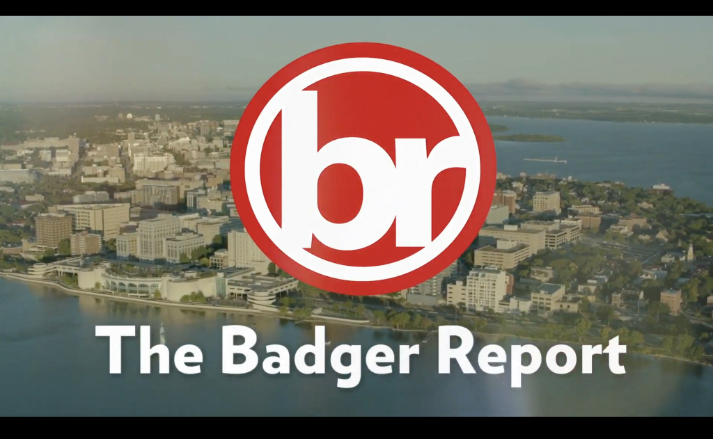 The Badger Report logo, the letters b and r in a red circle, over an aerial photo of the Madison skyline