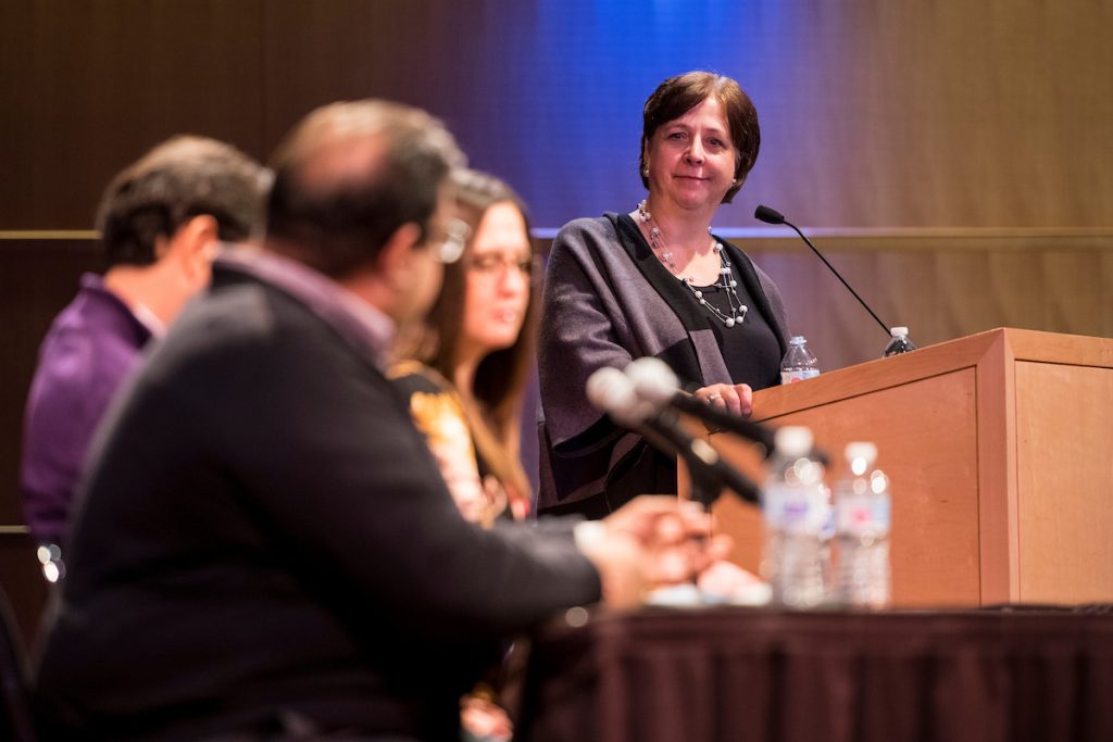 Prof. Katy Culver moderates a panel discussion