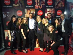 Ben Deutsch poses on the Coca Cola red carpet