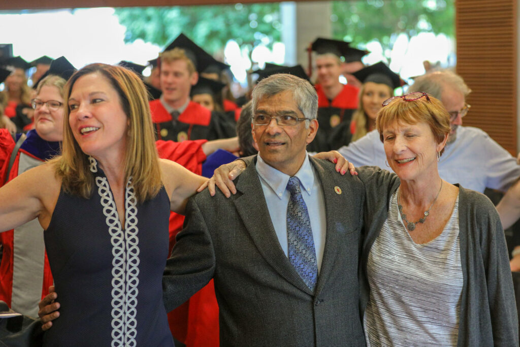 Deb Pierce, Hemant Shah and Pat Hastings sing Varsity