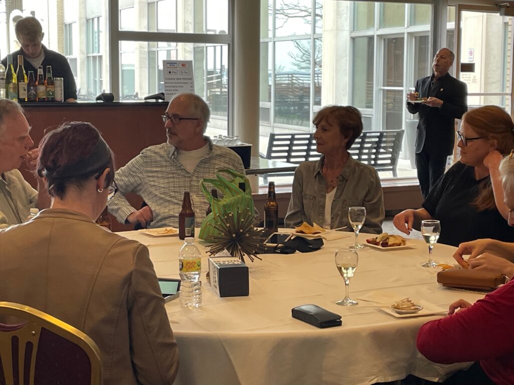 Robert Schwoch and Pat Hastings seated at a table