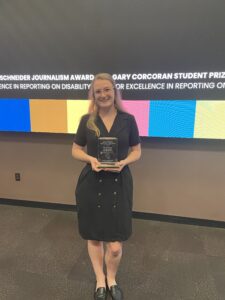 Erin Gretzinger accepting the award in Arizona