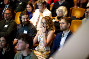 Stidham reacts to receiving the IES Abroad Study Abroad Film Festival Grand Prize at the awards ceremony in Chicago.