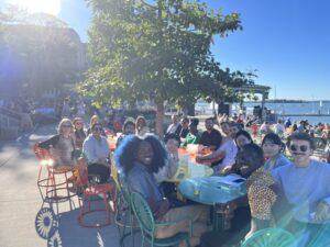 J-School faculty, staff and new graduate students socialize at the Memorial Union Terrace.