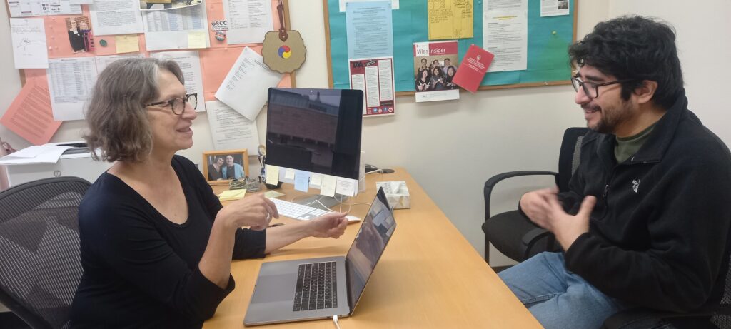 Graduate adviser Lisa Aarli advises a student in her office.