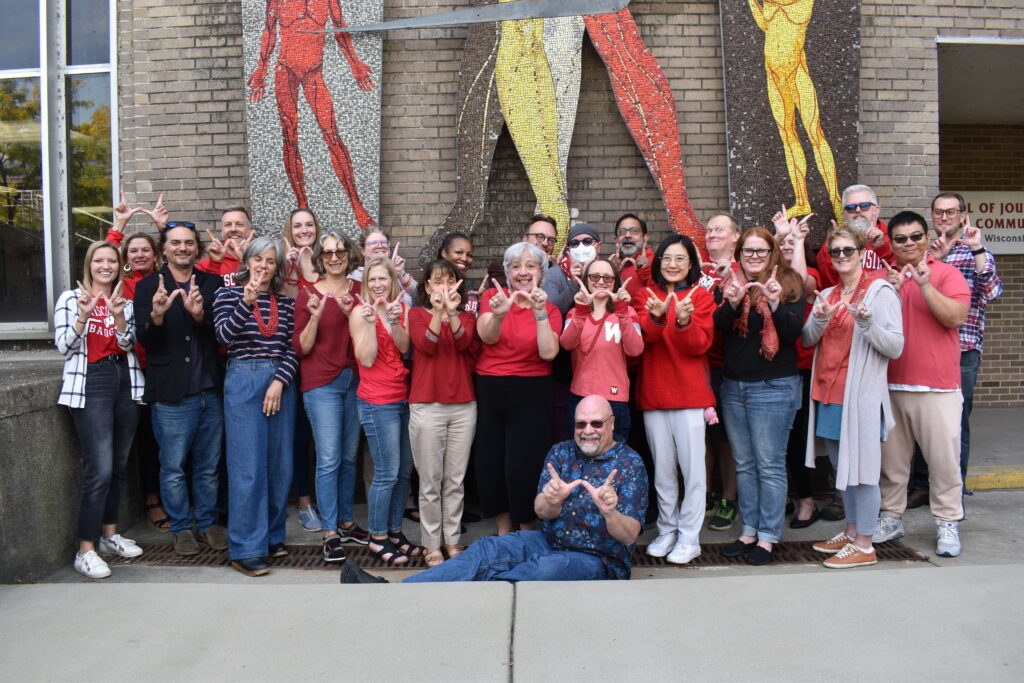 SJMC faculty and staff pose together outside of Vilas Hall