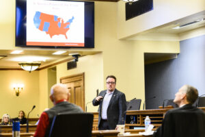 Professor Mike Wagner presents his research to lawmakers at the Wisconsin State Capitol.