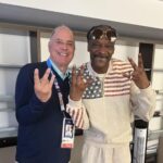 Greg Hughes poses with Snoop Dog at the 2024 Olympic Games in Paris.