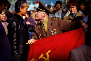 An angry Soviet Army colonel confronts a pro-democracy demonstrator at a May Day parade on Red Square in Moscow 1990.