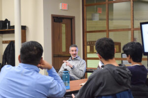 Adam Schrager teaches storytelling skills to students.