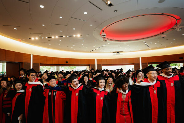 Graduates sing "Varsity" at the end of the 2025 SJMC Spring Graduation Celebration.